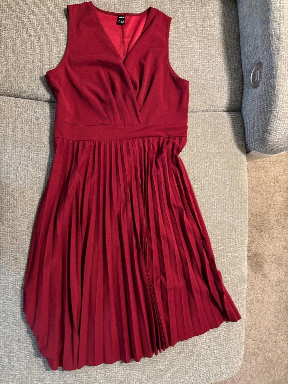 Red pleated dress
